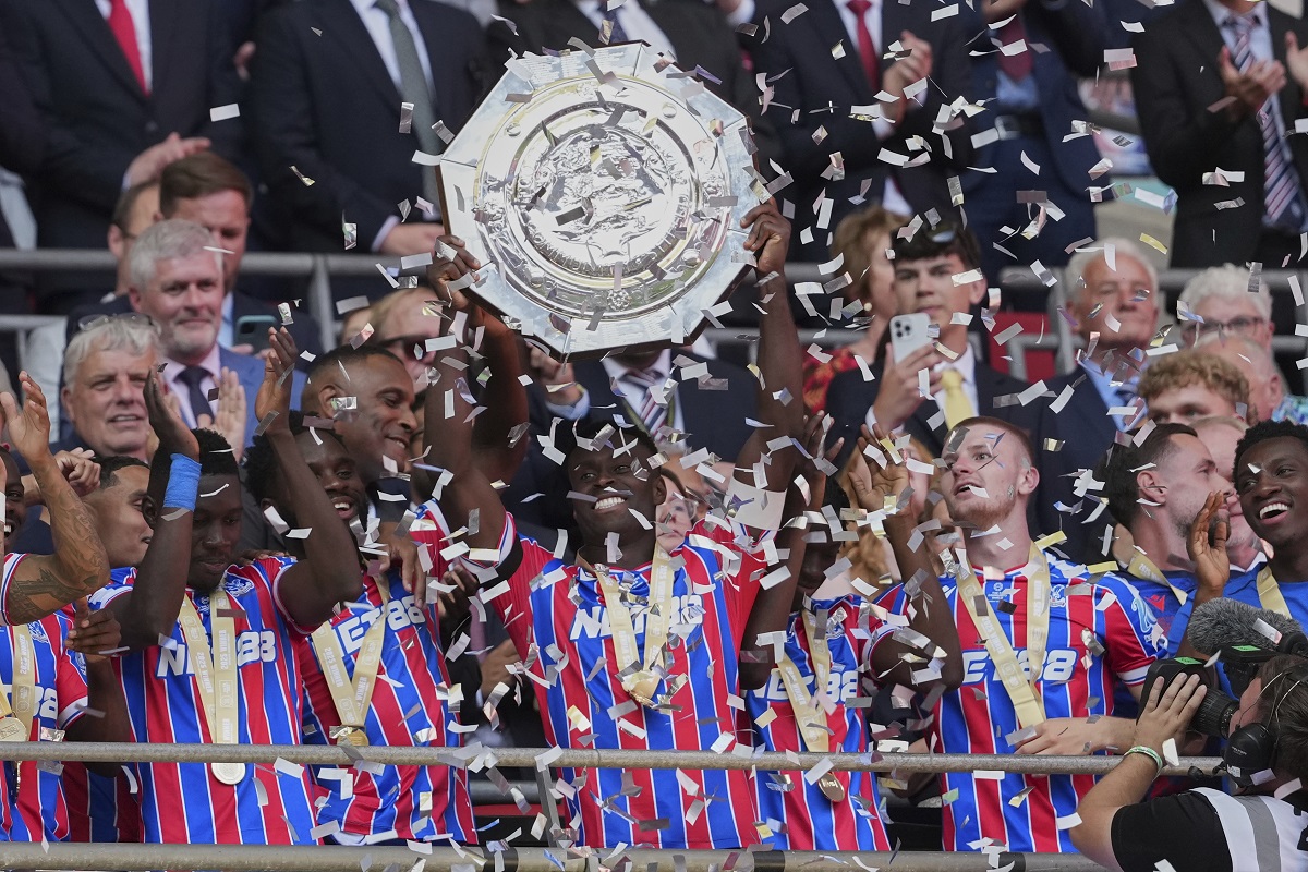 Crystal Palace players celebrate after winning the FA Community Shield final soccer match between Liverpool and Crystal Palace at Wembley Stadium in London,Sunday, Aug. 10, 2025. (AP Photo/Dave Shopland)