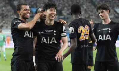 Tottenham Hotspur's Brennan Johnson, left, celebrates with his teammate Son Heung-min after scoring a goal against Newcastle United during the pre-season friendly match at Seoul World Cup Stadium in Seoul, South Korea, Sunday, Aug. 3, 2025. (AP Photo/Ahn Young-joon)