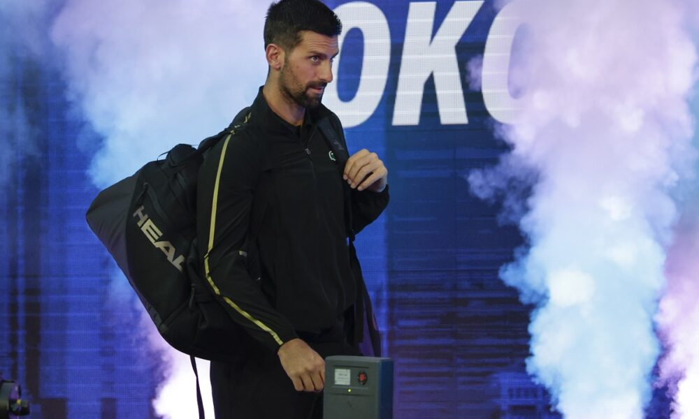 Novak Djokovic, of Serbia, arrives on the court to play against Jan-Lennard Struff, of Germany, during the fourth round of the U.S. Open tennis championships, Sunday, Aug. 31, 2025, in New York. (AP Photo/Adam Hunger)