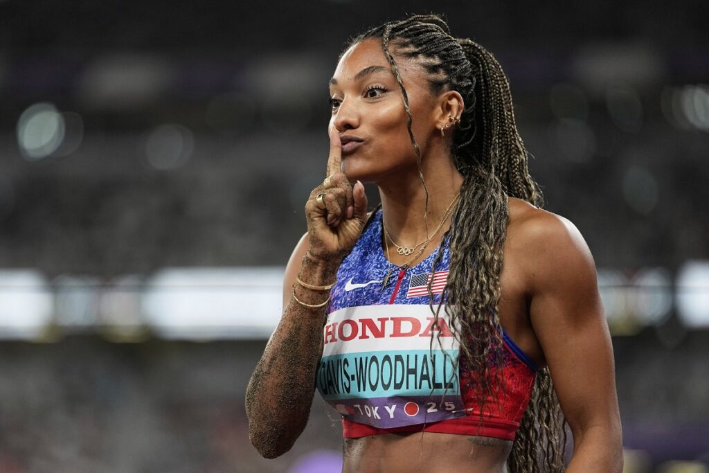 United States' Tara Davis-Woodhall reacts after winning the gold medal in the women's long jump final at the World Athletics Championships in Tokyo, Sunday, Sept. 14, 2025. (AP Photo/Ashley Landis)