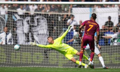 Roma's Lorenzo Pellegrini scores his side's opening goal past Lazio's goalkeeper Ivan Provedel during an Italian Serie A soccer match between Lazio and Roma, at the Olimpic Stadium, in Rome, Italy, Sunday, Sept. 21, 2025. (AP Photo/Alessandra Tarantino)
