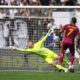 Roma's Lorenzo Pellegrini scores his side's opening goal past Lazio's goalkeeper Ivan Provedel during an Italian Serie A soccer match between Lazio and Roma, at the Olimpic Stadium, in Rome, Italy, Sunday, Sept. 21, 2025. (AP Photo/Alessandra Tarantino)