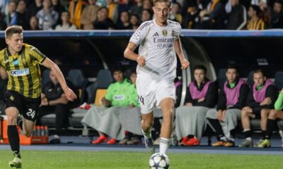 Real Madrid's Dean Huijsen, right, controls the ball as Kairat's Alexander Mrynskiy tries to stop him during the Champions League opening phase soccer match between Kairat Almaty and Real Madrid at Ortalyk stadium in Almaty, Kazakhstan, Tuesday, Sept. 30, 2025. (AP Photo/Alikhan Sariyev)