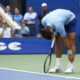 Novak Djokovic, of Serbia, reacts after losing a point to Carlos Alcaraz, of Spain, during the men's singles semifinals of the U.S. Open tennis championships, Friday, Sept. 5, 2025, in New York. (AP Photo/Kirsty Wigglesworth)