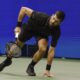 Novak Djokovic, of Serbia, chases down a shot form Jan-Lennard Struff, of Germany, during the fourth round of the US Open tennis championships, Sunday, Aug. 31, 2025, in New York. (AP Photo/Adam Hunger)