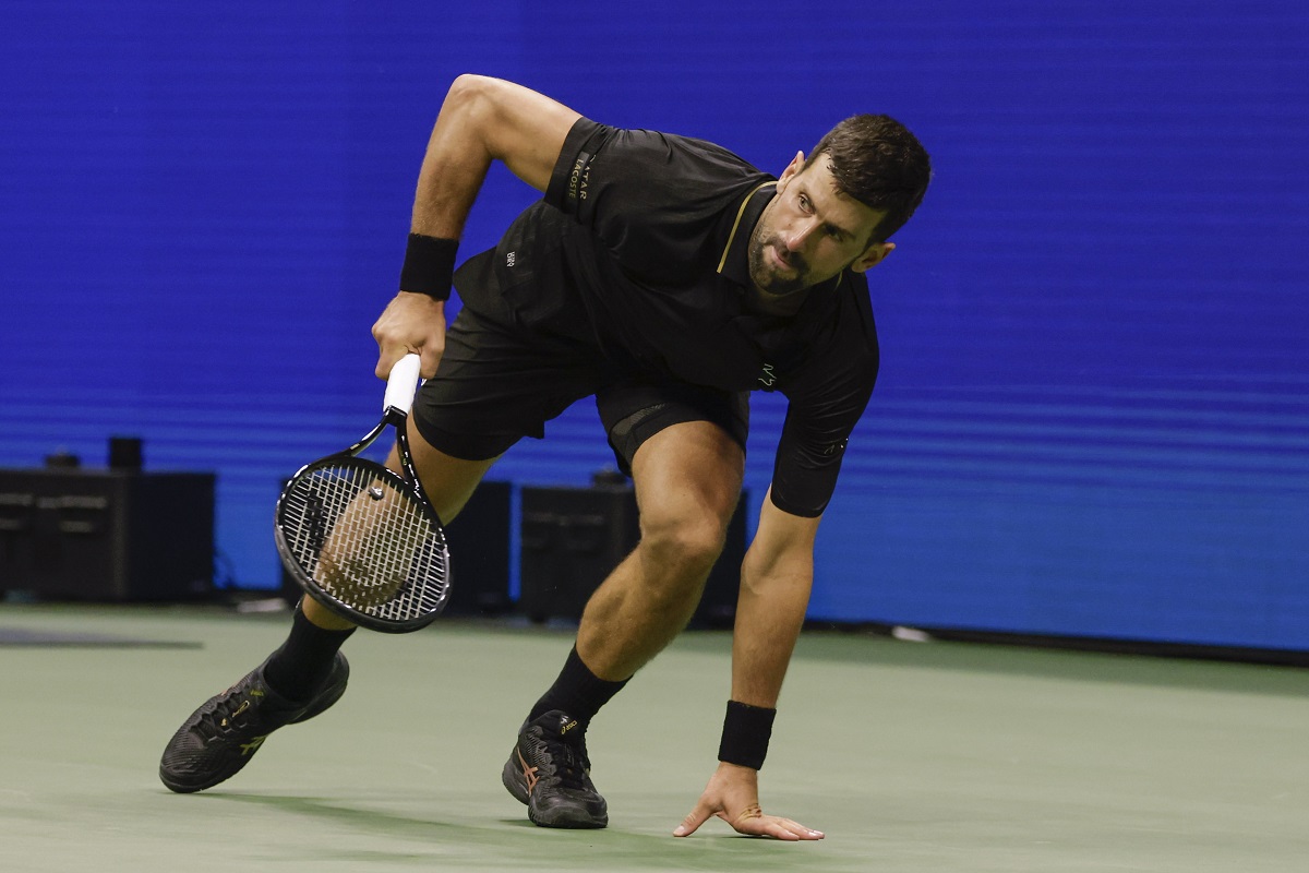 Novak Djokovic, of Serbia, chases down a shot form Jan-Lennard Struff, of Germany, during the fourth round of the US Open tennis championships, Sunday, Aug. 31, 2025, in New York. (AP Photo/Adam Hunger)