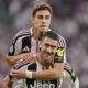 Juventus' Kenan Yildiz, top, celebrates with Dusan Vlahovic after scoring during the Serie A soccer match between Juventus and Inter at the Allianz Stadium in Turin, Italy, Saturday, Sept. 13, 2025. (Marco Alpozzi/LaPresse via AP)
