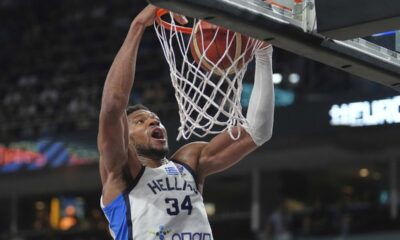 Greece's Giannis Antetokounmpo scores during the Eurobasket, European Basketball Championship third place match between Greece and Finland at the Riga Arena in Riga, Latvia, Sunday, Sept. 14, 2025. (AP Photo/Sergei Grits)