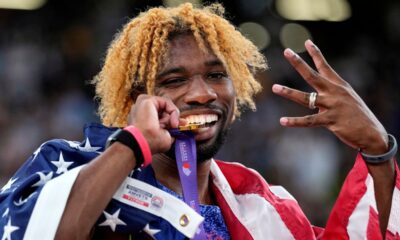 United States' Noah Lyles poses after winning the gold medal in the men's 200 meters final at the World Athletics Championships in Tokyo, Friday, Sept. 19, 2025. (AP Photo/Matthias Schrader)