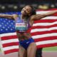 United States' Tara Davis-Woodhall reacts after winning the gold medal in the women's long jump final at the World Athletics Championships in Tokyo, Sunday, Sept. 14, 2025. (AP Photo/Ashley Landis)