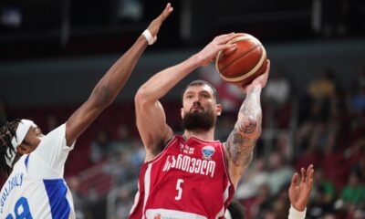 Georgia's Alexander Mamukelashvili tries to shoot while defended by France's Bilal Coulibaly during the Eurobasket, European Basketball Championship round of 16 match between France and Georgia at the Riga Arena in Riga, Latvia, Sunday, Sept. 7, 2025. (AP Photo/Sergei Grits)