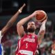 Georgia's Alexander Mamukelashvili tries to shoot while defended by France's Bilal Coulibaly during the Eurobasket, European Basketball Championship round of 16 match between France and Georgia at the Riga Arena in Riga, Latvia, Sunday, Sept. 7, 2025. (AP Photo/Sergei Grits)