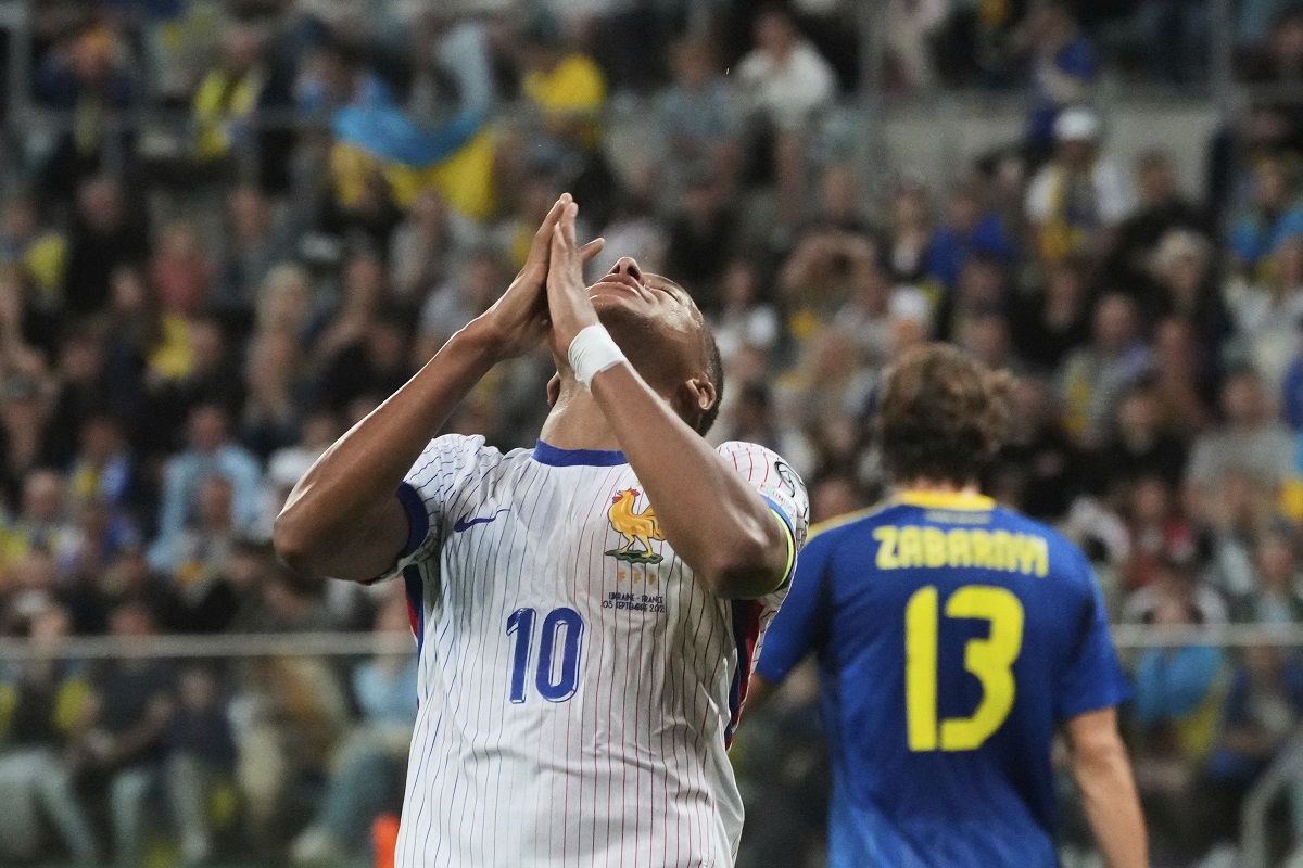 France's Kylian Mbappe reacts after missing a scoring chance during the 2026 FIFA World Cup qualifying soccer match between Ukraine and France at Tarczynski Arena in Wroclaw, Poland, Friday, Sept. 5, 2025. (AP Photo/Czarek Sokolowski)