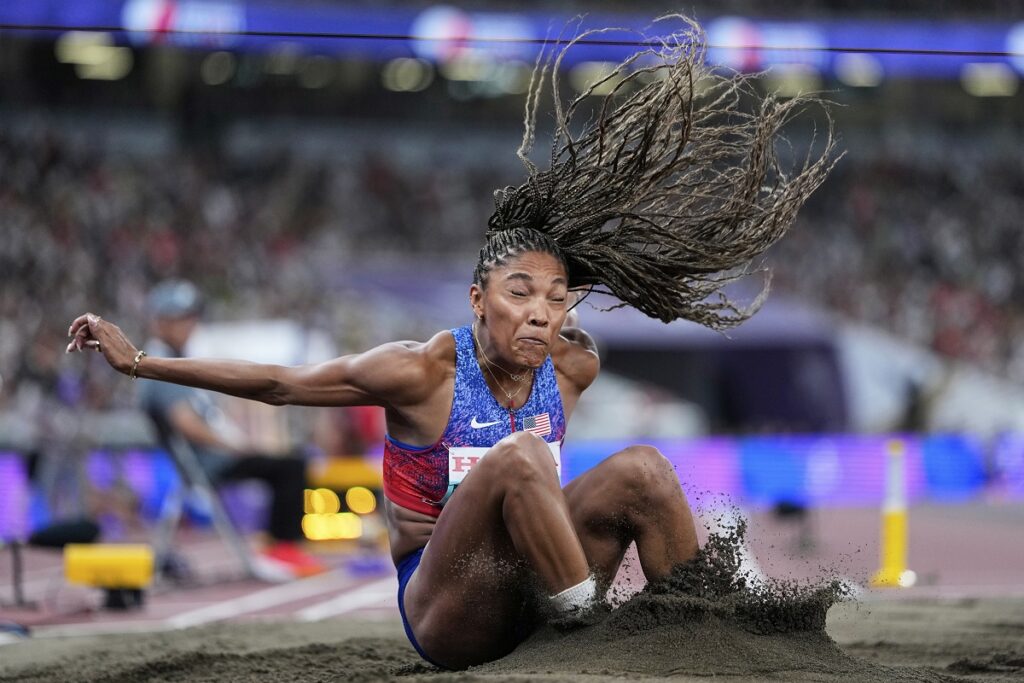 United States' Tara Davis-Woodhall competes in the women's long jump final at the World Athletics Championships in Tokyo, Sunday, Sept. 14, 2025. (AP Photo/Ashley Landis)