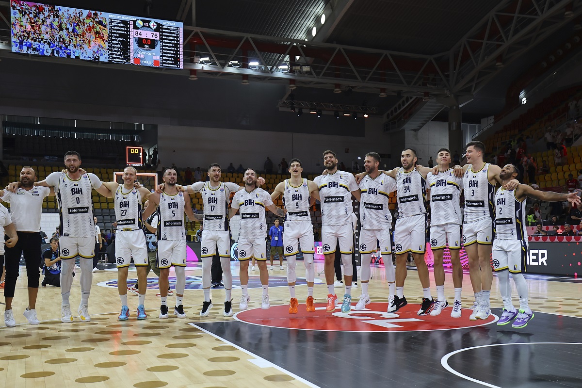 Bosnia players celebrate the win of their team after the Eurobasket, European Basketball Championship Group C match between Bosnia and Georgia at Spyros Kyprianou Arena, in Limassol, Cyprus, Thursday, Sept. 4, 2025. (AP Photo/Sakis Savvides)