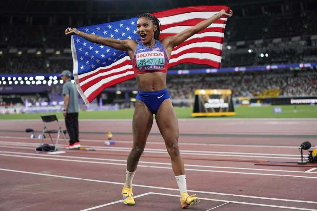 United States' Tara Davis-Woodhall reacts after winning the gold medal in the women's long jump final at the World Athletics Championships in Tokyo, Sunday, Sept. 14, 2025. (AP Photo/Ashley Landis)