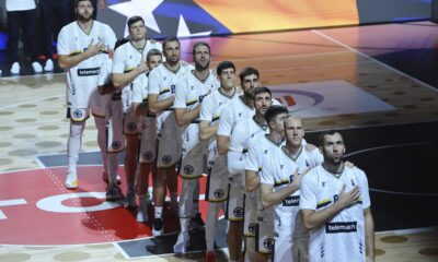 Players of Bosnia stand for their national anthem before the Eurobasket, European Basketball Championship Group C match between Bosnia and Georgia at Spyros Kyprianou Arena, in Limassol, Cyprus, Thursday, Sept. 4, 2025. (AP Photo/Sakis Savvides)