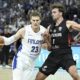 Finland's Lauri Markkanen with Germany's Franz Wagner, right, during the Eurobasket basketball match match between Finland and Germany in Tampere, Finland, Wednesday, Sept. 3, 2025. (Heikki Saukkomaa/Lehtikuva via AP)