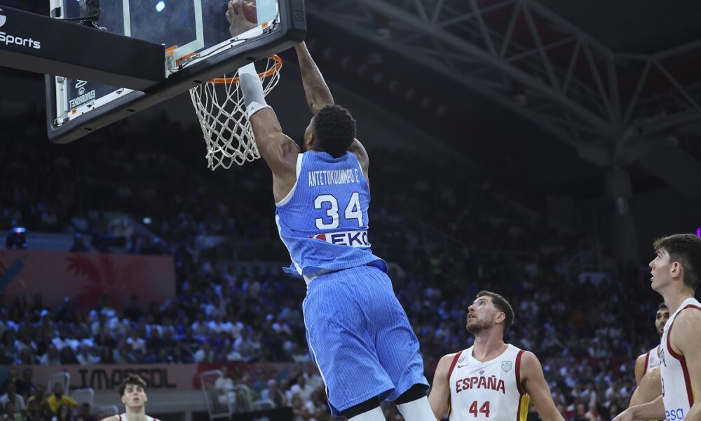 Greece's Giannis Antetokounmpo dunks the ball during the Eurobasket, European Basketball Championship Group C match between Spain and Greece at Spyros Kyprianou Arena, in Limassol, Cyprus, Thursday, Sept. 4, 2025. (AP Photo/Sakis Savvides)