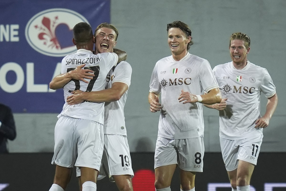 Napoli's Rasmus Hojlund celebrates after scoring during the Serie A soccer match between Fiorentina and Napoli at the Artemio Franchi Stadium in Florence, Italy, Saturday, Sept. 13, 2025. (Massimo Paolone/LaPresse via AP)