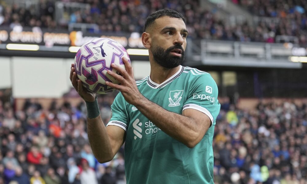 Liverpool's Mohamed Salah catches the ball during the Premier League soccer match between Burnley and Liverpool in Burnley, England, Sunday, Sept. 14, 2025. (AP Photo/Jon Super)
