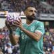 Liverpool's Mohamed Salah catches the ball during the Premier League soccer match between Burnley and Liverpool in Burnley, England, Sunday, Sept. 14, 2025. (AP Photo/Jon Super)