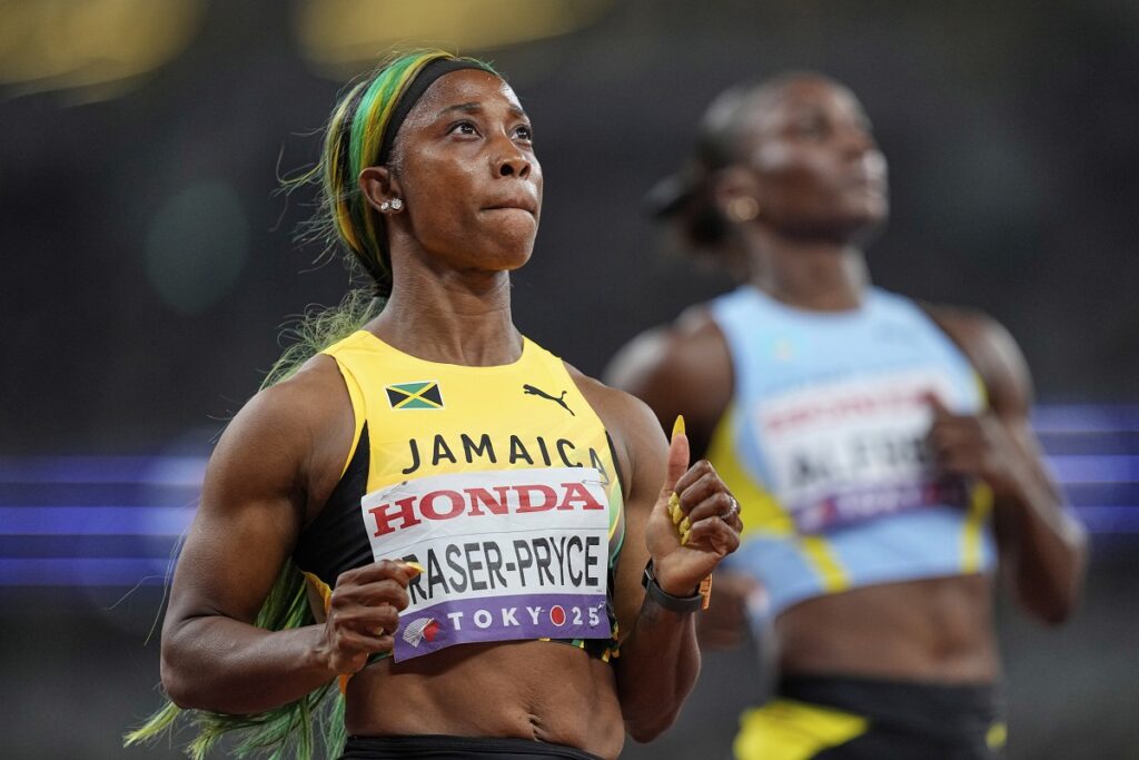 Jamaica's Shelly-Ann Fraser-Pryce finishes a women's 100 meters semifinal at the World Athletics Championships in Tokyo, Sunday, Sept. 14, 2025. (AP Photo/Petr David Josek)