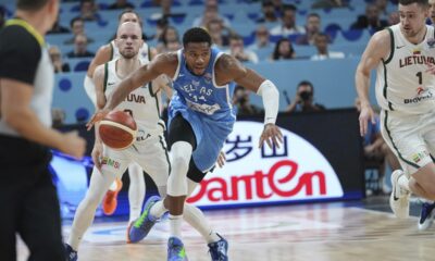 Greece's Giannis Antetokounmpo, centre, in action during the Eurobasket, European Basketball Championship quarter final match between Lithuania and Greece at the Riga Arena in Riga, Latvia, Tuesday, Sept. 9, 2025. (AP Photo/Sergei Grits)