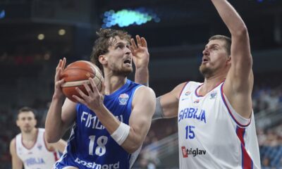 Finland's Mikael Jantunen, left, and Serbia's Nikola Jokic in action during the Eurobasket, European Basketball Championship round of 16 match between Serbia and Finland at the Riga Arena in Riga, Latvia, Saturday, Sept. 6, 2025. (AP Photo/Sergei Grits)
