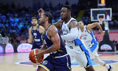 Greece's Thanasis Antetokounmpo defends against Bosnia's John Roberson, left, during the Eurobasket, European Basketball Championship Group C match between Greece and Bosnia at Spyros Kyprianou Arena, in Limassol, Cyprus, Tuesday, Sept. 2, 2025. (AP Photo/Chara Savvidou)