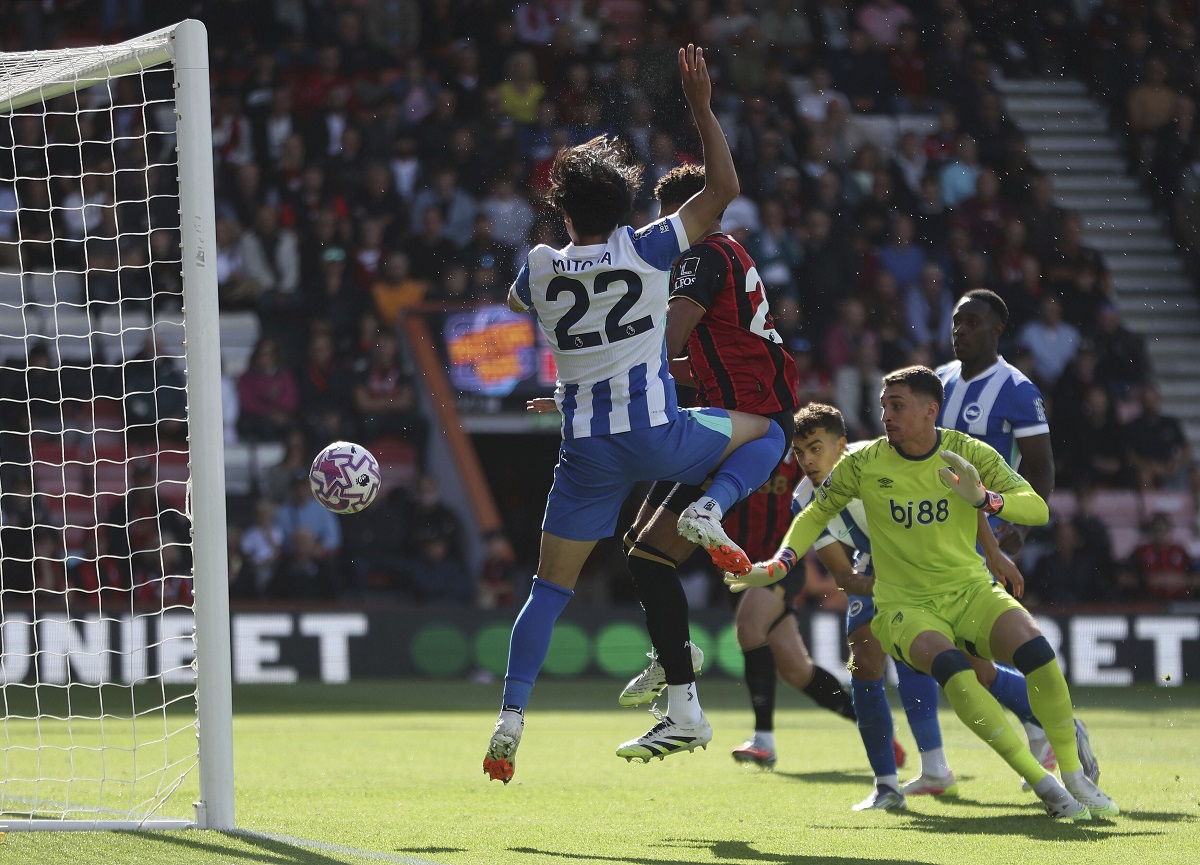 Brighton and Hove Albion's Kaoru Mitoma scores his side's first goal during the English Premier League soccer match between Bournemouth and Brighton and Hove Albion, at the Vitality Stadium, Bournemouth, England, Saturday Sept. 13, 2025. (Steven Paston/PA via AP)