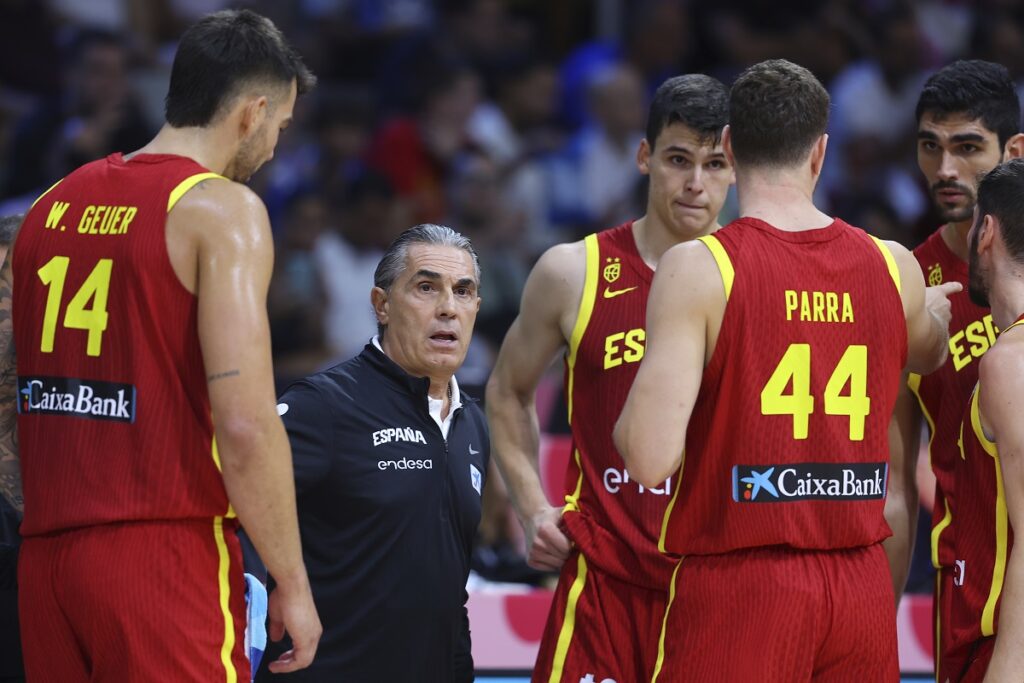 Spain's head coach Sergio Scariolo gives instructions to his players during the Eurobasket, European Basketball Championship Group C match between Spain and Italy at Spyros Kyprianou Arena, in Limassol, Cyprus, Tuesday, Sept. 2, 2025. (AP Photo/Chara Savvidou)