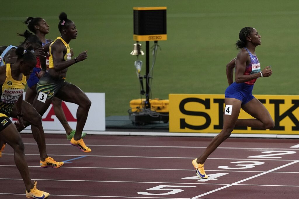 United States' Melissa Jefferson-Wooden crosses the line to win the gold medal in the women's 100 meters final at the World Athletics Championships in Tokyo, Sunday, Sept. 14, 2025. (AP Photo/Louise Delmotte)