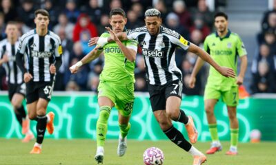 Newcastle United's Joelinton, right, and Fulham's Sasa Lukic in action during the English Premier League soccer match between Newcastle United and Fulham at St James' Park, Newcastle-upon-Tyne, England, Saturday Oct. 25, 2025. (Richard Sellers/PA via AP)