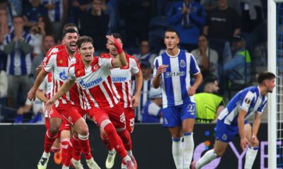 Red Star's Vasilije Kostov, foreground, celebrates after scoring his side's first goal during the Europa League opening phase soccer match between FC Porto and Red Star Belgrade at the Dragao stadium in Porto, Portugal, Thursday, Oct. 2, 2025. (AP Photo/Luis Vieira)