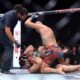 Alex Pereira, right, of Brazil, hits UFC light heavyweight champion Magomed Ankalaev, of Russia, as the referee looks on during the UFC 320 mixed martial arts bout Saturday, Oct. 4, 2025, in Las Vegas. (Steve Marcus/Las Vegas Sun via AP)