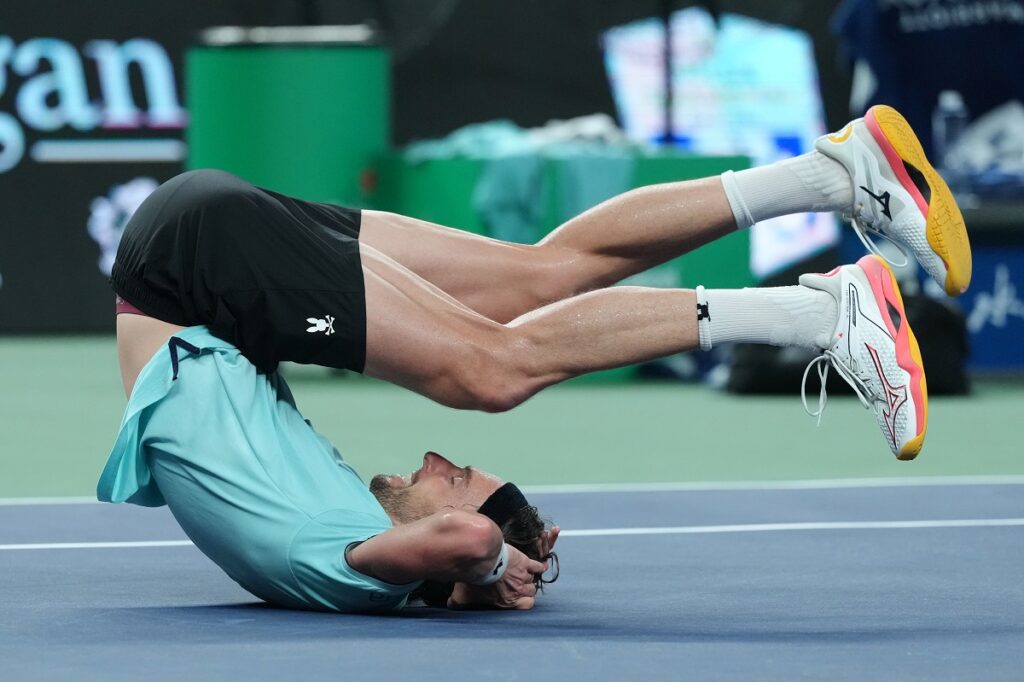 Arthur Rinderknech of France reacts after defeating Daniil Medvedev of Russia in their men's singles semifinal match of the Shanghai Masters tennis tournament at Qizhong Forest Sports City Tennis Center, in Shanghai, China, Saturday, Oct. 11, 2025. (AP Photo/Andy Wong)