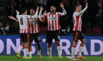 PSV's Ismael Saibari second right, celebrates with a teammates after scoring his sides fifth goal during the Champions League opening phase soccer match between PSV and Napoli in Eindhoven, Netherlands,Tuesday, Oct. 21, 2025. (AP Photo/Patrick Post)