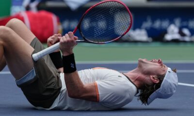 Zizou Bergs, of Belgium, reacts after defeating Gabriel Diallo, of Canada in the men's singles match of the Shanghai Masters tennis tournament at Qizhong Forest Sports City Tennis Center, in Shanghai, China, Tuesday, Oct. 7, 2025. (AP Photo/Andy Wong)