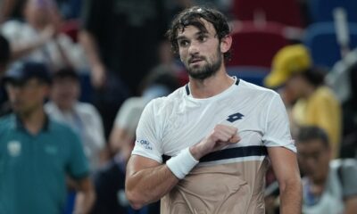 Valentin Vacherot of Monaco reacts after defeating Novak Djokovic of Serbia in the men's singles semifinal match of the Shanghai Masters tennis tournament at Qizhong Forest Sports City Tennis Center, in Shanghai, China, Saturday, Oct. 11, 2025. (AP Photo/Andy Wong)