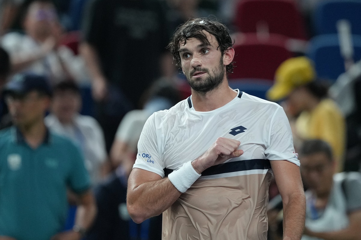 Valentin Vacherot of Monaco reacts after defeating Novak Djokovic of Serbia in the men's singles semifinal match of the Shanghai Masters tennis tournament at Qizhong Forest Sports City Tennis Center, in Shanghai, China, Saturday, Oct. 11, 2025. (AP Photo/Andy Wong)