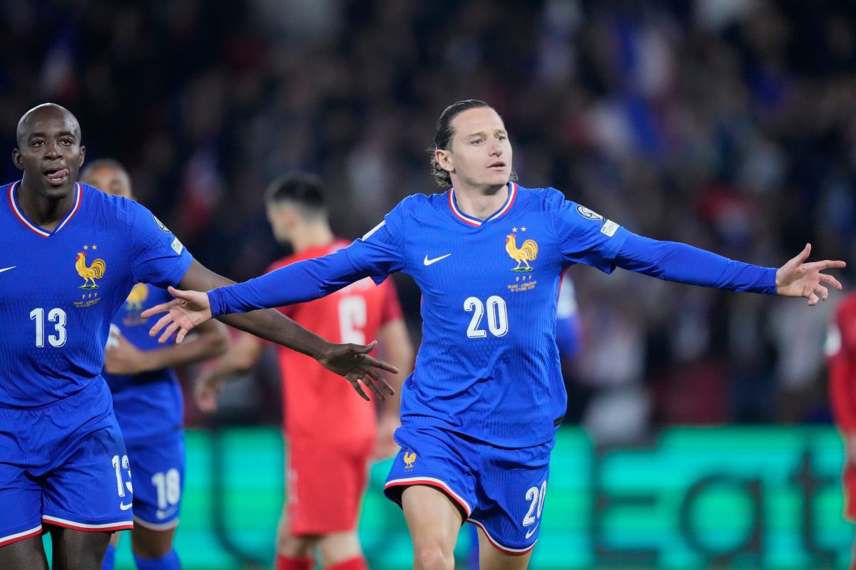 France's Florian Thauvin celebrates after scoring during a World Cup 2026 Group D qualifying soccer match between France and Azerbaijan in Paris, France, on Friday, Oct. 10, 2025. (AP Photo/Michel Euler)