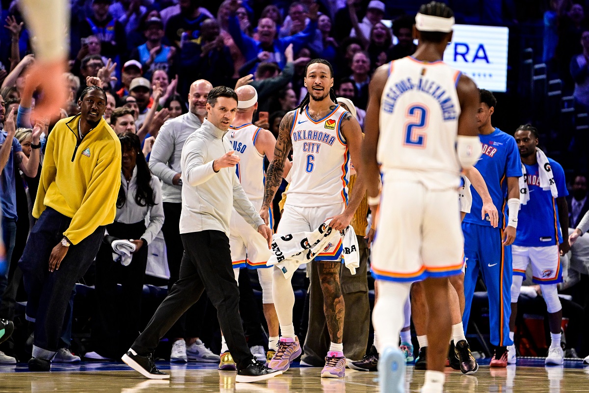 Oklahoma City Thunder Head Coach Mark Daigneault gestures to Oklahoma City Thunder guard Shai Gilgeous-Alexander (2) during the second half of an NBA basketball game between Sacramento Kings and Oklahoma City Thunder, Tuesday, Oct. 28, 2025, in Oklahoma City. (AP Photo/Gerald Leong)