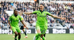 Fulham's Sasa Lukic celebrates scoring during the English Premier League soccer match between Newcastle United and Fulham at St James' Park, Newcastle-upon-Tyne, England, Saturday Oct. 25, 2025. (Richard Sellers/PA via AP)