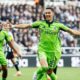 Fulham's Sasa Lukic celebrates scoring during the English Premier League soccer match between Newcastle United and Fulham at St James' Park, Newcastle-upon-Tyne, England, Saturday Oct. 25, 2025. (Richard Sellers/PA via AP)