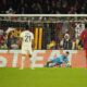 CORRECTS ID TO BERKE ÖZER, NOT MILE SVILAR - Lille goalkeeper Berke Özer saves a penalty kicked by Roma's Artem Dovbyk during the Europa League Europa League soccer match between AS Roma and Lille at the Olympic stadium in Rome, Thursday, Oct. 2, 2025. (AP Photo/Andrew Medichini)