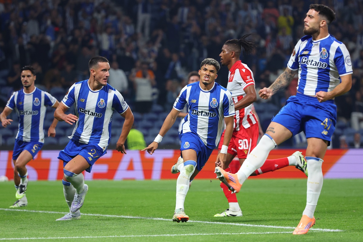 Porto's William Gomes, center, celebrates after scoring the opening goal from the penalty spot during the Europa League opening phase soccer match between FC Porto and Red Star Belgrade at the Dragao stadium in Porto, Portugal, Thursday, Oct. 2, 2025. (AP Photo/Luis Vieira)