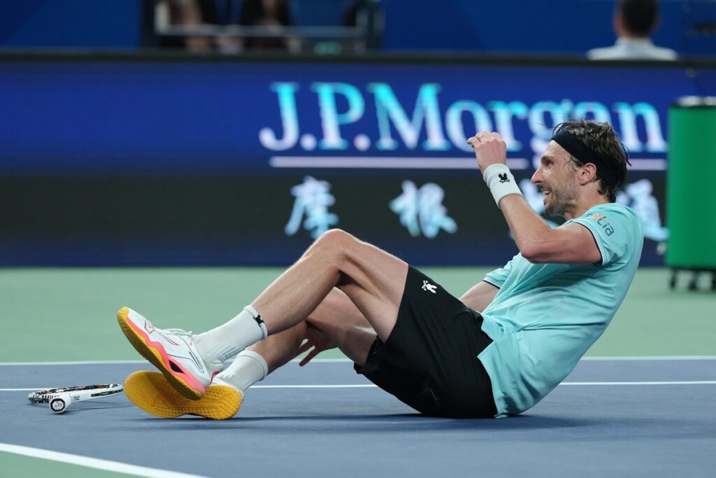 Arthur Rinderknech of France reacts after defeating Daniil Medvedev of Russia in their men's singles semifinal match of the Shanghai Masters tennis tournament at Qizhong Forest Sports City Tennis Center, in Shanghai, China, Saturday, Oct. 11, 2025. (AP Photo/Andy Wong)