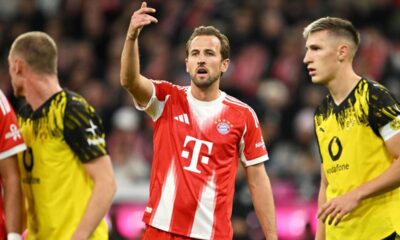 Bayern's Harry Kane, centre, during the Bundesliga soccer match between Bayern Munich and Borussia Dortmund in Munich, Germany, Saturday, Oct. 18, 2025. (AP Photo/Lennart Preiss)