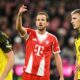 Bayern's Harry Kane, centre, during the Bundesliga soccer match between Bayern Munich and Borussia Dortmund in Munich, Germany, Saturday, Oct. 18, 2025. (AP Photo/Lennart Preiss)